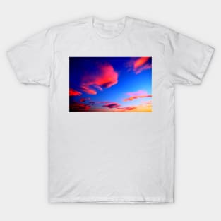 Plenty of bright pink clouds scattered on the yellow-blue sky T-Shirt